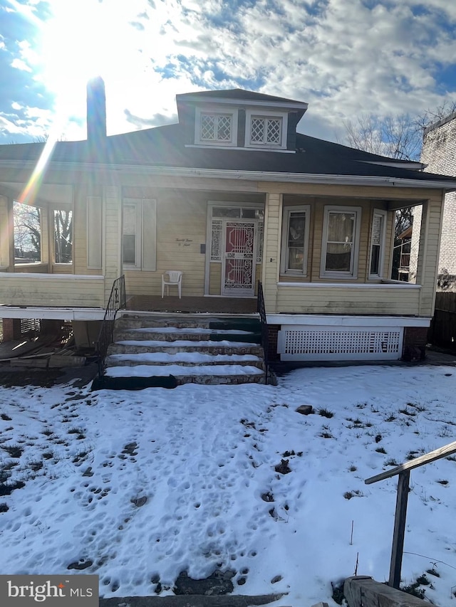 bungalow-style house with a porch