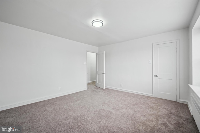 spare room with carpet