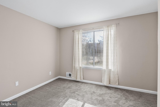 view of carpeted spare room