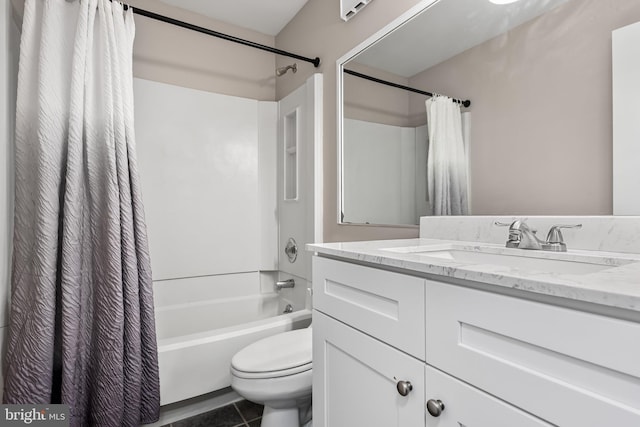 full bathroom with tile patterned floors, vanity, toilet, and shower / bath combo