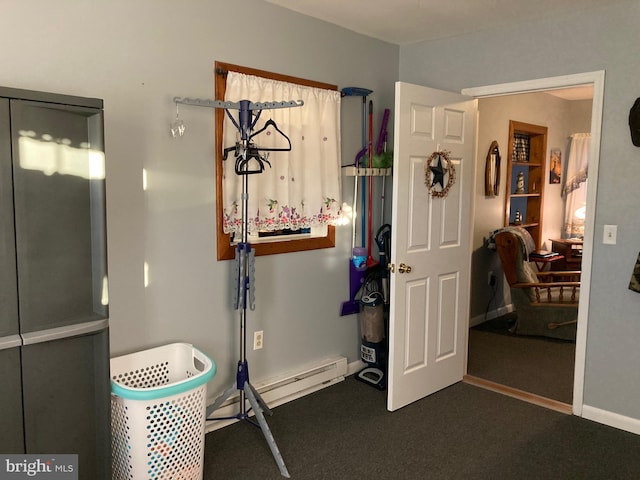 interior space featuring a baseboard radiator and baseboards