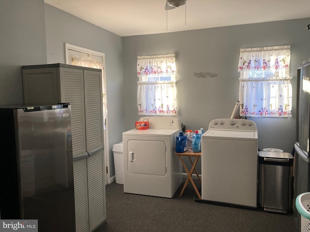 laundry area with laundry area and separate washer and dryer