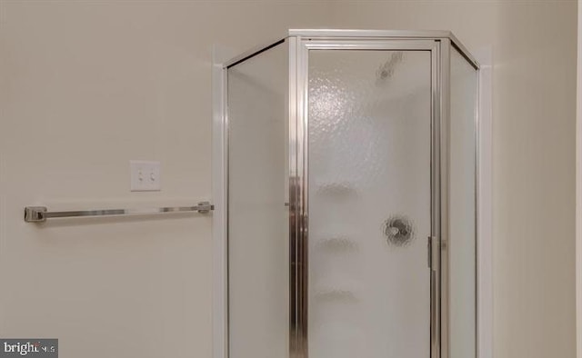 bathroom with an enclosed shower