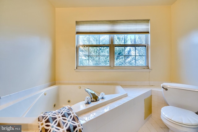 bathroom with a relaxing tiled tub and toilet