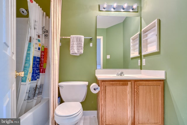 full bathroom with shower / tub combo with curtain, vanity, toilet, and tile patterned floors