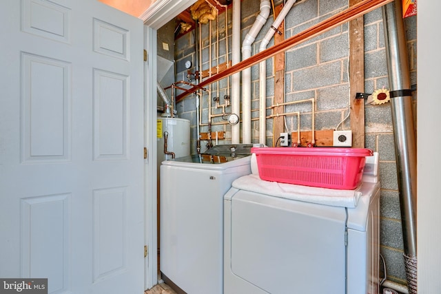 washroom featuring separate washer and dryer and gas water heater