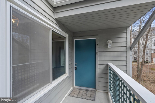 property entrance with a balcony