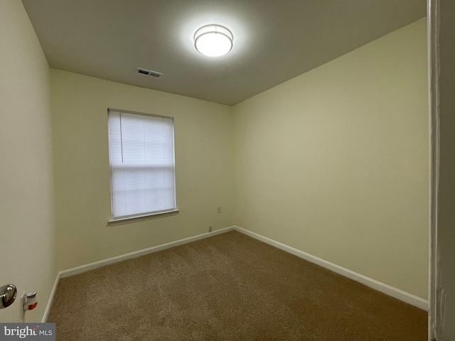 empty room with carpet floors