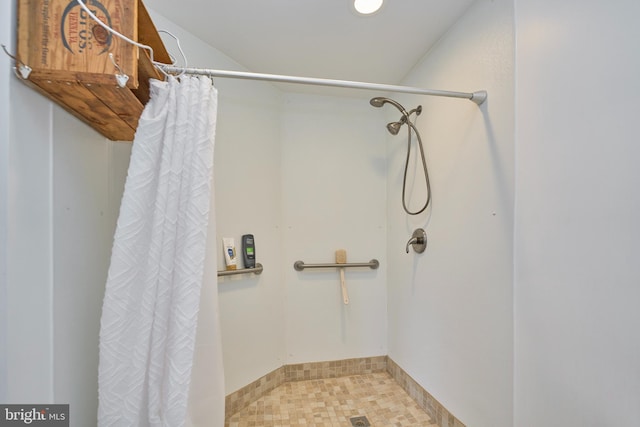 full bathroom with a shower stall