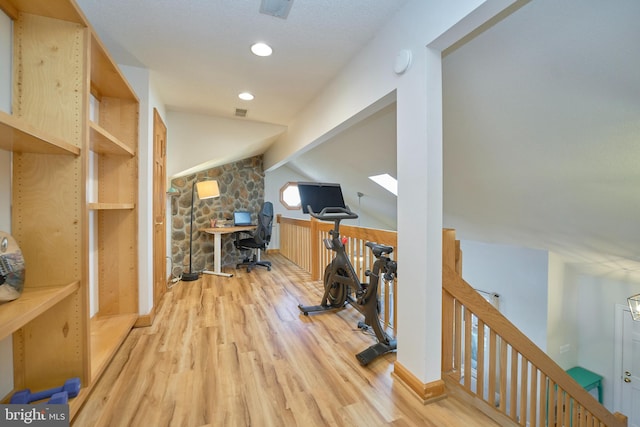 office space with vaulted ceiling with beams, recessed lighting, and light wood-style floors