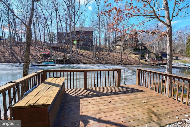 wooden terrace with a water view