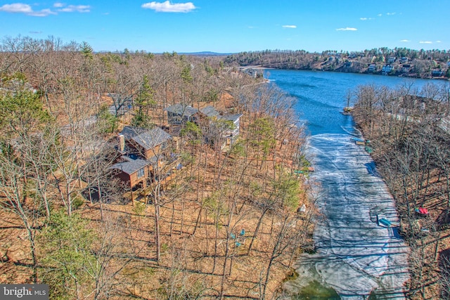 drone / aerial view with a water view