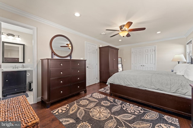 bedroom with dark wood finished floors, recessed lighting, ornamental molding, a ceiling fan, and connected bathroom