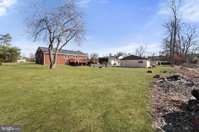 view of yard with a deck