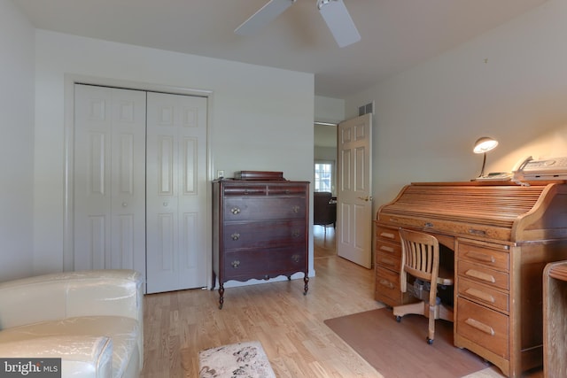 office area with ceiling fan and light hardwood / wood-style flooring