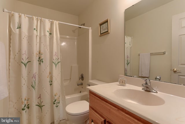 full bathroom featuring vanity, toilet, and shower / bath combo with shower curtain