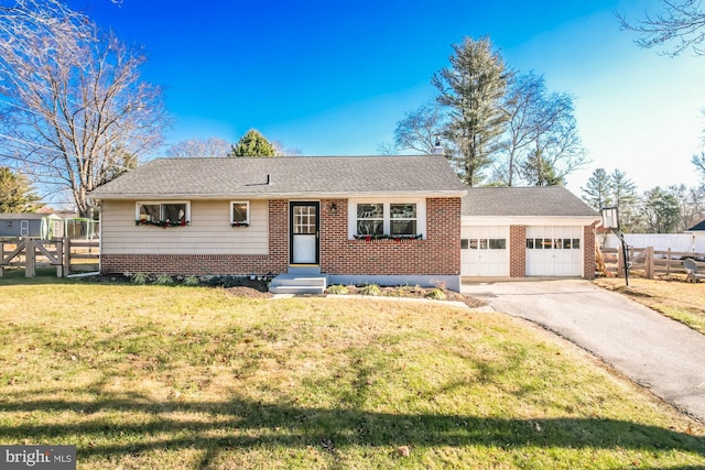 single story home with a garage and a front yard