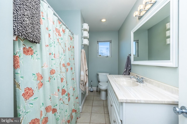 bathroom with vanity, tile patterned floors, toilet, and a shower with shower curtain