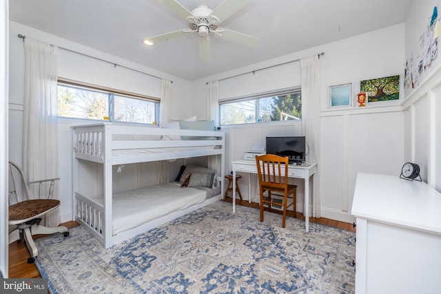 bedroom with hardwood / wood-style floors