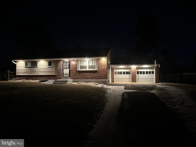 view of front of property with a garage