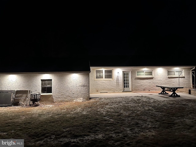 view of front of property featuring a patio