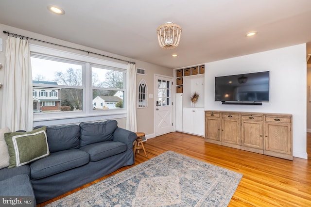 living room featuring light wood-type flooring