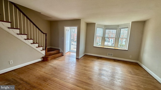 entryway with light hardwood / wood-style flooring