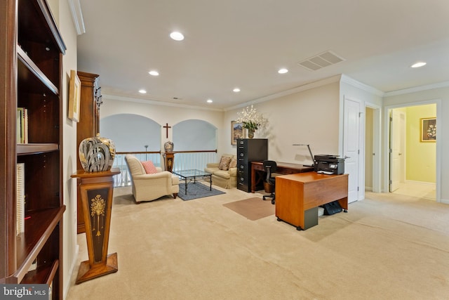 office space with arched walkways, recessed lighting, visible vents, and light colored carpet