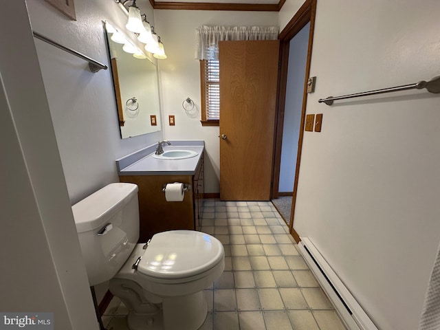 half bathroom featuring a baseboard radiator, vanity, toilet, and baseboards