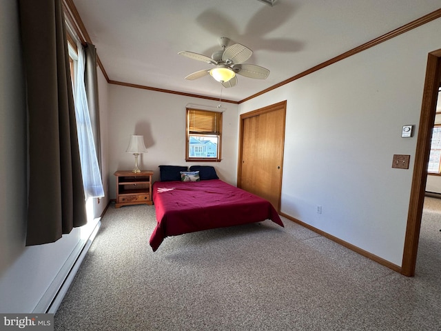 bedroom featuring ornamental molding, a closet, light colored carpet, and baseboards