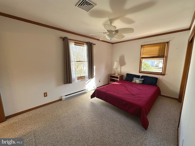 bedroom featuring baseboards, visible vents, carpet, crown molding, and a baseboard heating unit