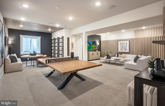 game room featuring light colored carpet