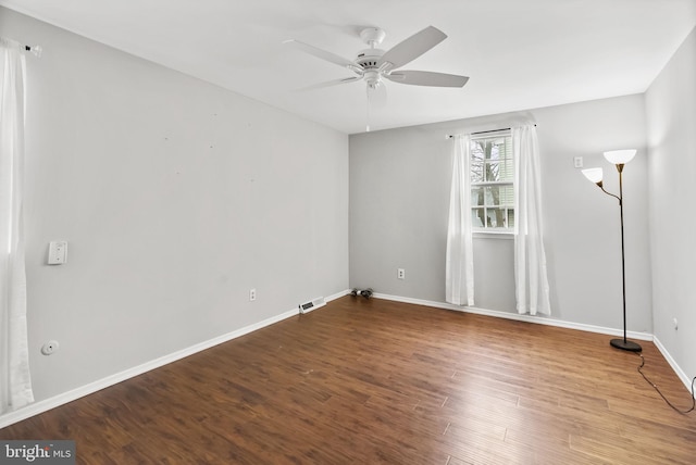 unfurnished room featuring ceiling fan and wood-type flooring