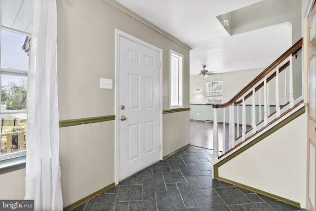 foyer with ceiling fan