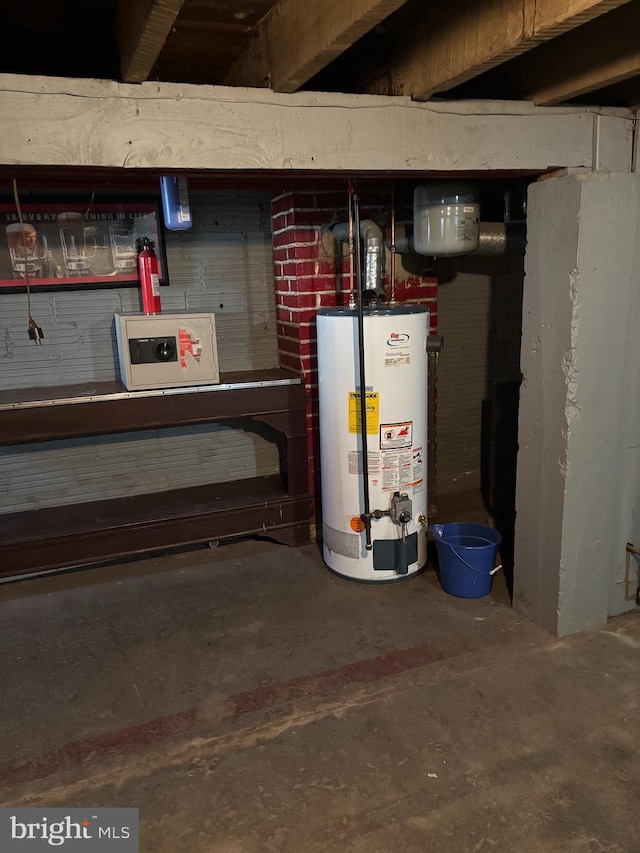 utility room featuring water heater