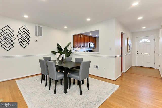 dining room featuring light wood-type flooring