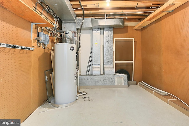 utility room with electric water heater