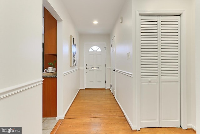 doorway featuring light hardwood / wood-style floors