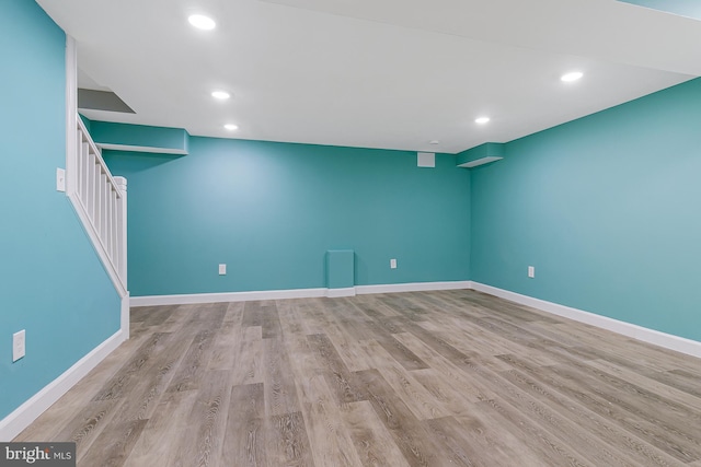 unfurnished room featuring light hardwood / wood-style floors