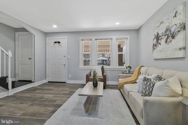 living room featuring dark hardwood / wood-style flooring