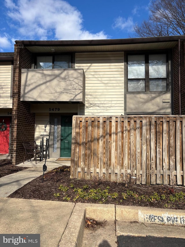 exterior space with a balcony