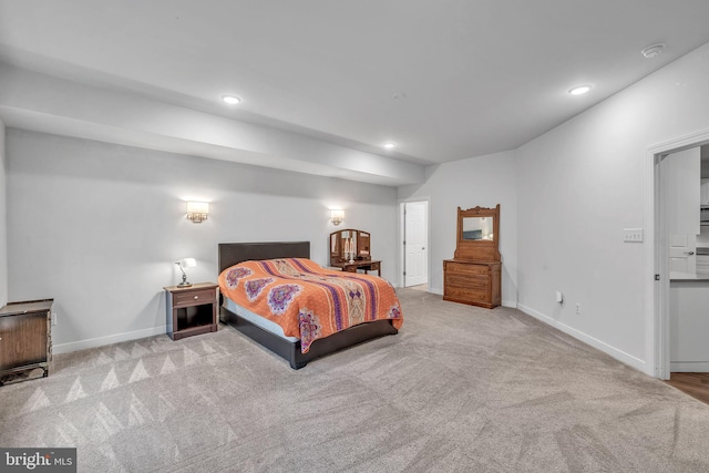 bedroom with light colored carpet