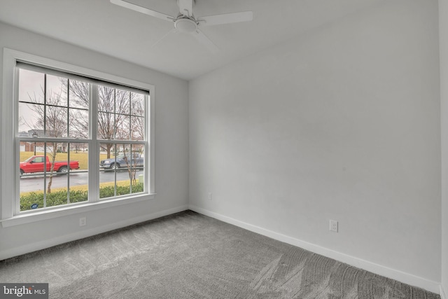 carpeted empty room with ceiling fan