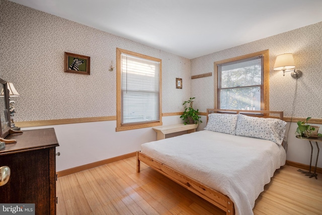 bedroom featuring hardwood / wood-style floors