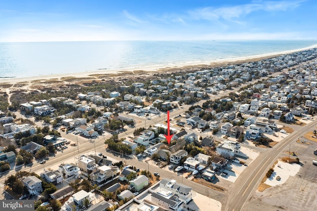 drone / aerial view with a view of the beach and a water view