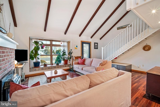 living room with beamed ceiling, dark hardwood / wood-style floors, high vaulted ceiling, and a brick fireplace