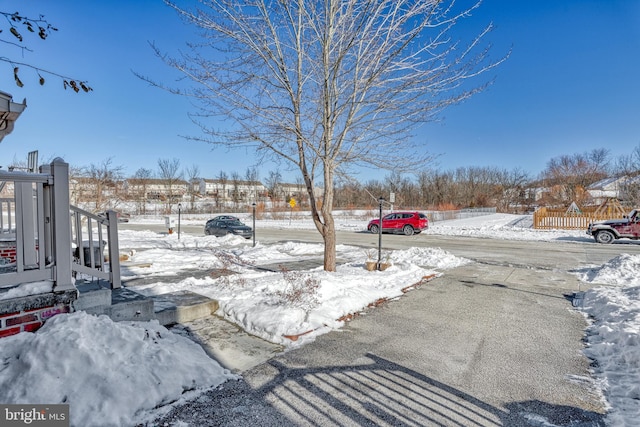 view of yard covered in snow