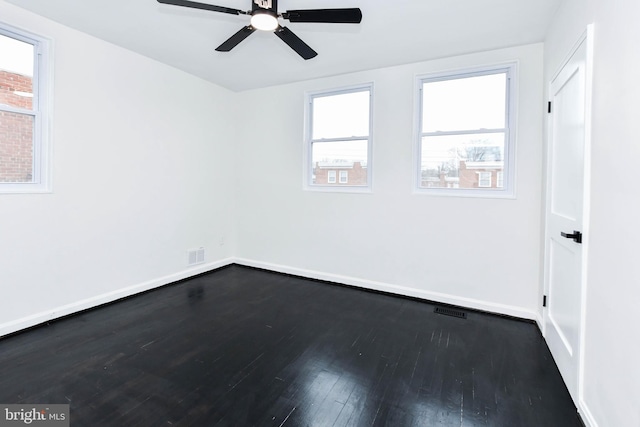 empty room with wood-type flooring and ceiling fan