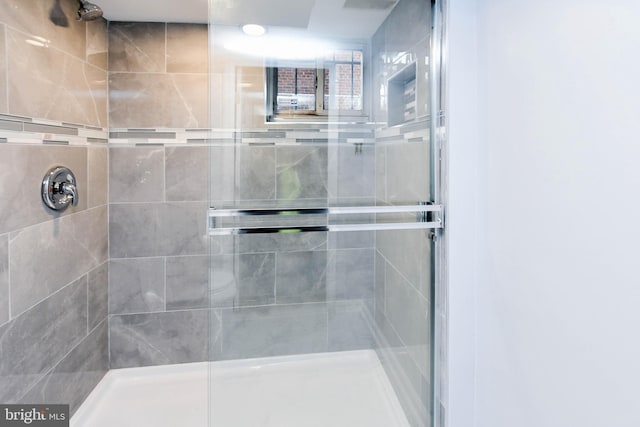 bathroom with an enclosed shower