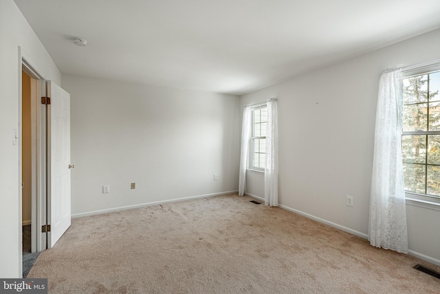 view of carpeted spare room